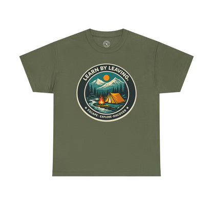 Olive green unisex t-shirt featuring Learn By Leaving camping circular badge graphic with tent, campfire, mountains and escape explore discover design