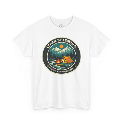 White unisex t-shirt featuring Learn By Leaving camping circular badge graphic with tent, campfire, mountains and escape explore discover design