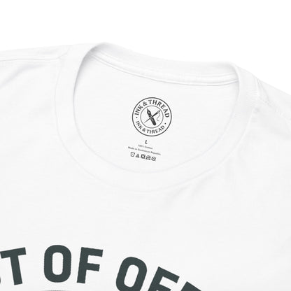 Close-up of Ink and Thread UK branded inner neck label on white t-shirt with Out of Office Permanent graphic design