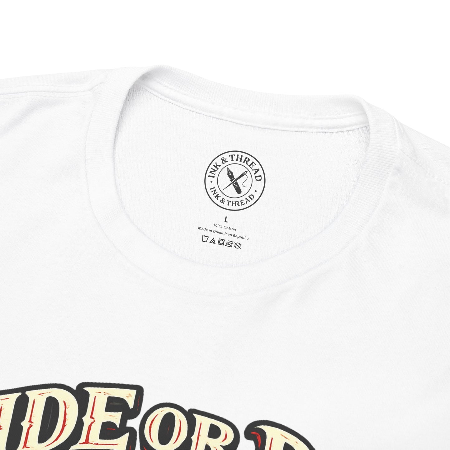 Close-up of Ink & Thread UK branded neck label on white Ride or Die t-shirt showing quality branding and care instructions