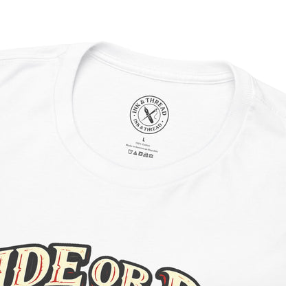 Close-up of Ink & Thread UK branded neck label on white Ride or Die t-shirt showing quality branding and care instructions