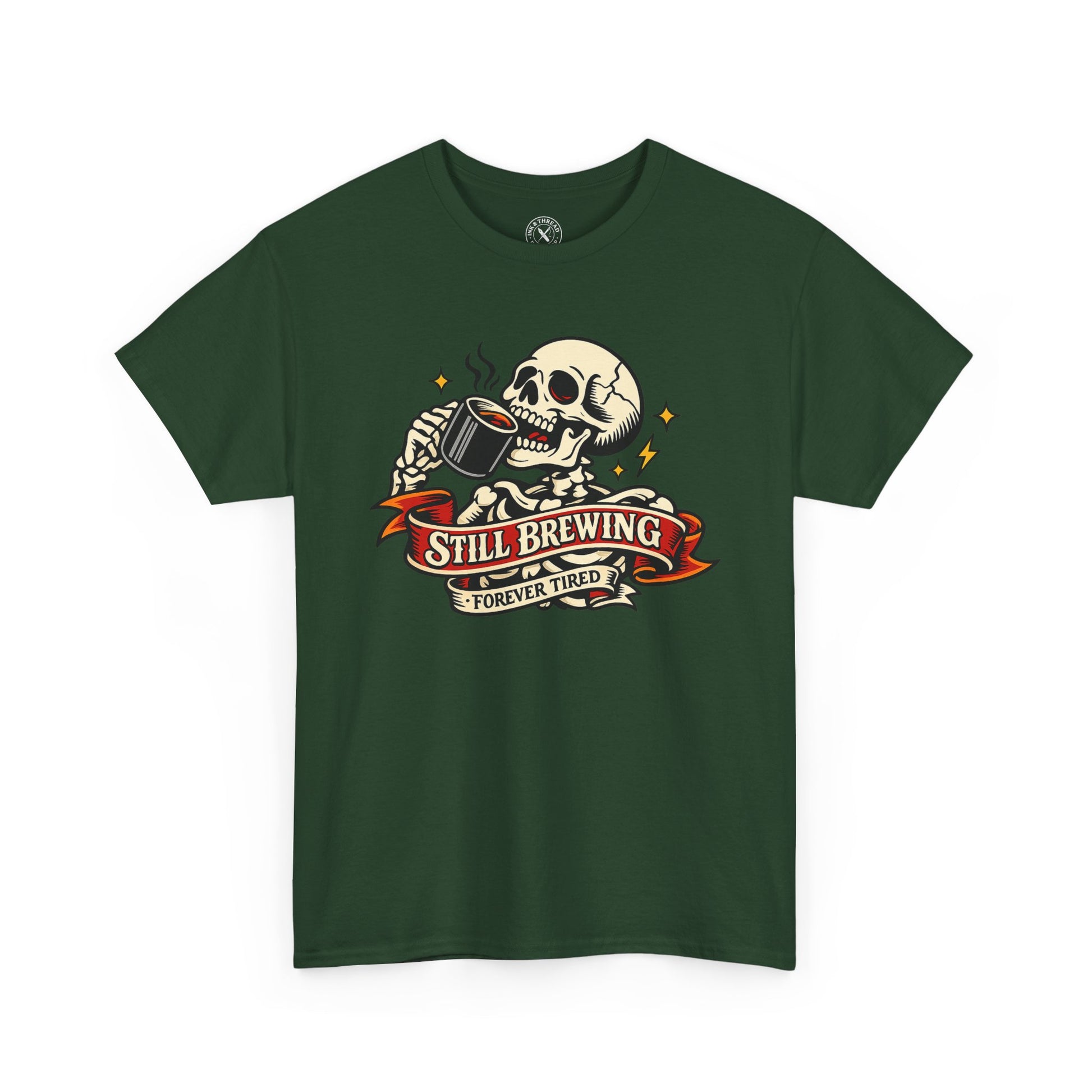 Green t-shirt with a skull and cup graphic and 'Still Brewing Forever Tired' text on a white background
