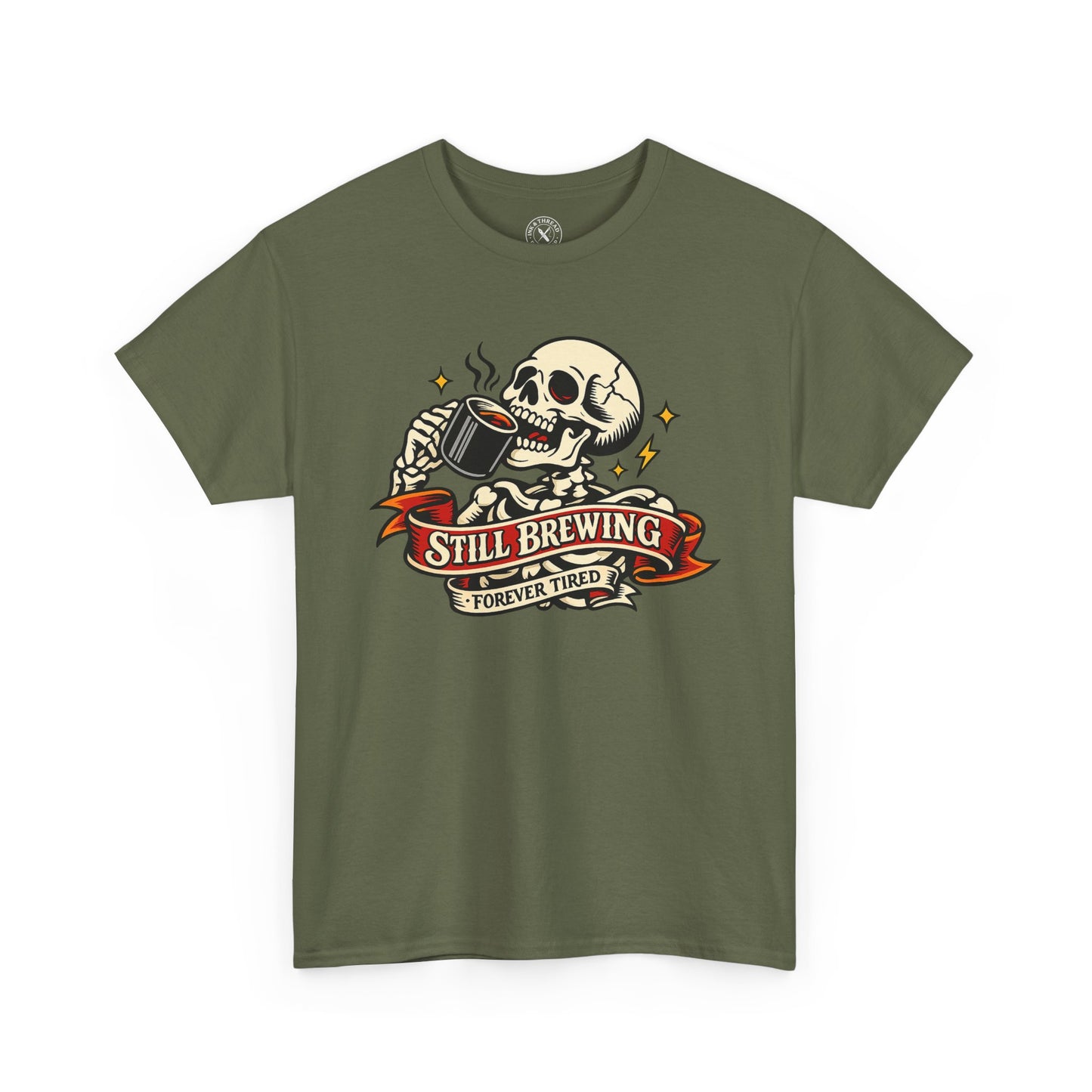 Green t-shirt with a skull and coffee cup graphic and 'Still Brewing Forever Tired' text on a white background.