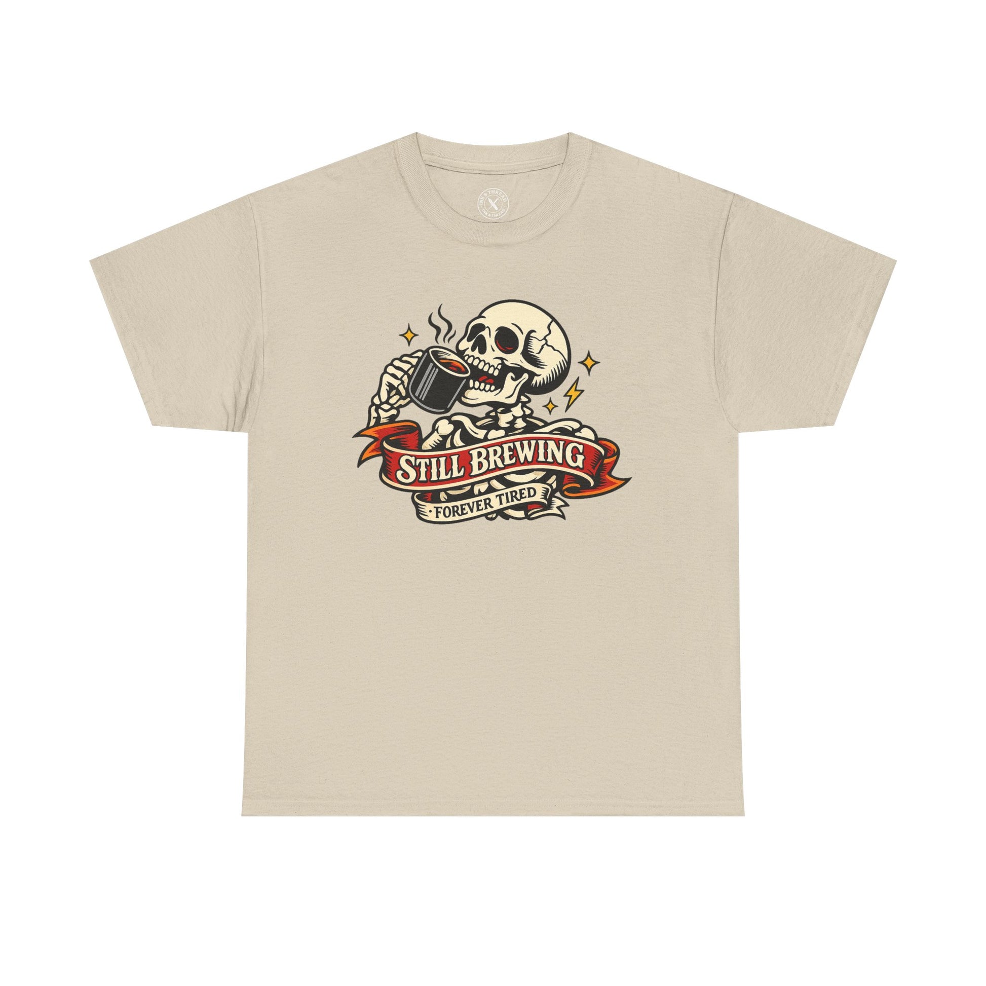 "Still Brewing Forever Tired" skull graphic t-shirt in sand beige, Ink & Thread