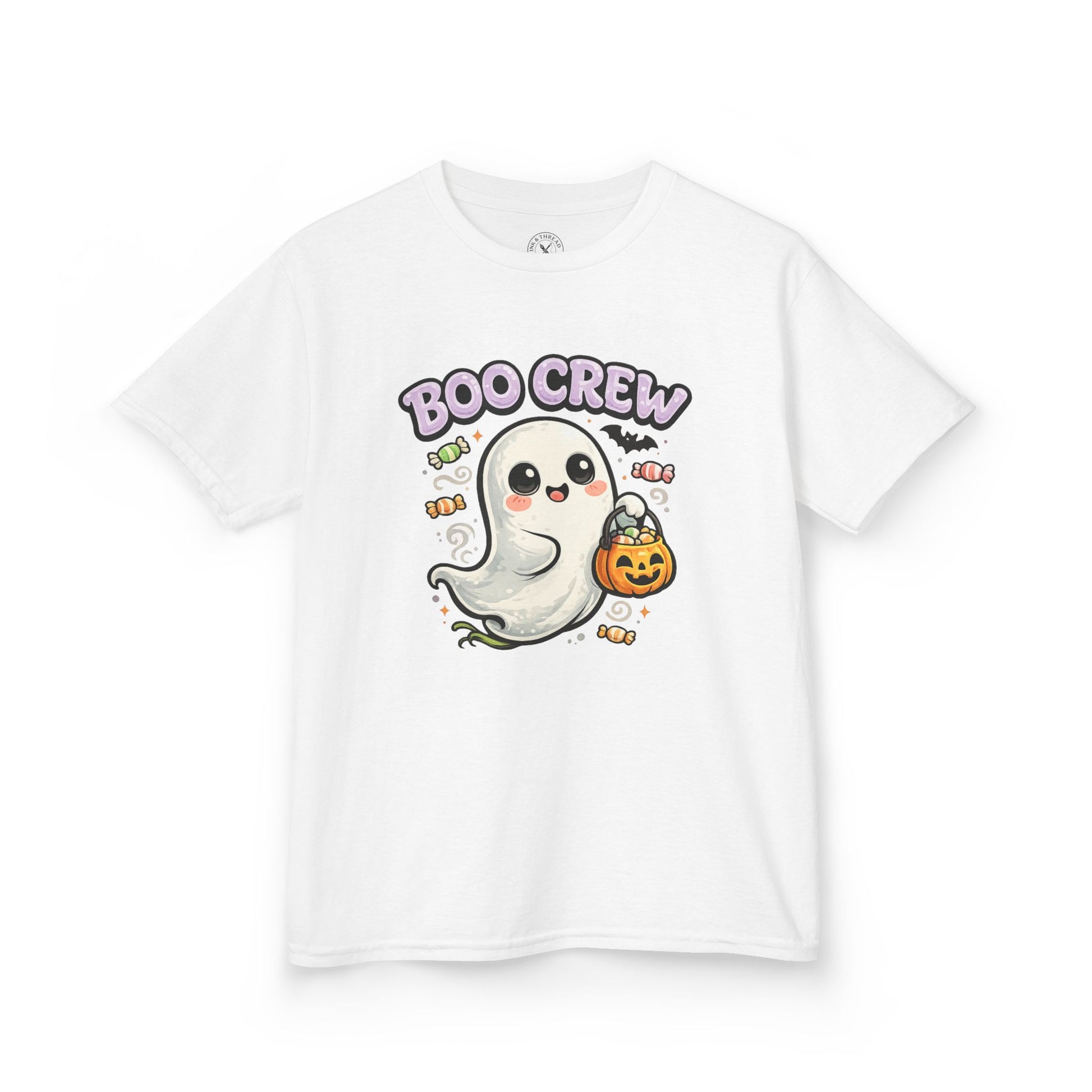 White t-shirt featuring a cute ghost with pumpkin candy bucket and Boo Crew Halloween graphic print